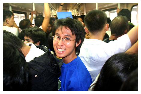 Joma inside a crowded LRT 1 coach, Manila